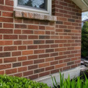 Repaired Toronto brick wall after freeze-thaw masonry damage