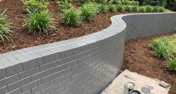 Brick-retaining-wall-newly-painted